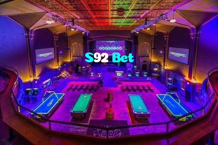 S92 Bet casino presented on mobile device in Pakistan with slots and live games